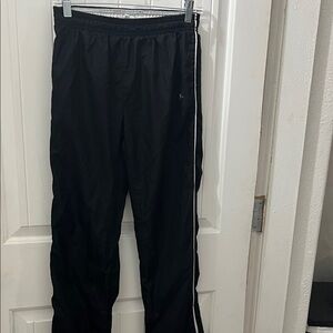 Danskin Now Black WindBreaker pants with White Side Stripe